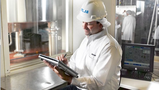 CIP Expert Working in a Beverage Processing Plant