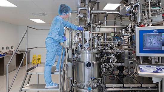 Ecolab cleaning validation expert testing the cleanliness of a pharmaceutical production drum