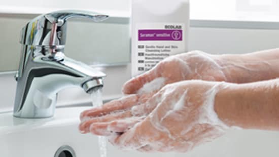 Washing hands in a sink