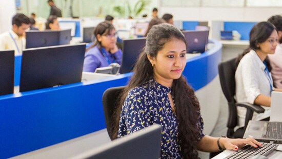 Woman at desk in call center
