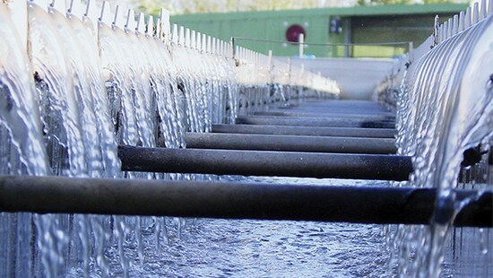 Water flowing over pipes