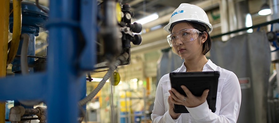 Ecolab Expert reviewing data in a power plant