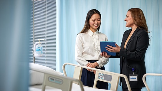 Women standing by power grid - Ecolab workforce development