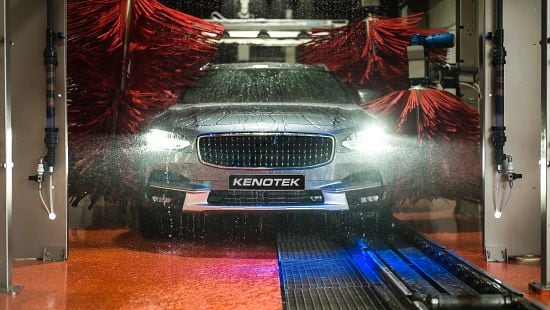 Front view of Kenotek car moving through car wash as it is cleaned.