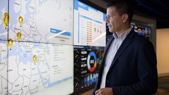 Man examining map graphic